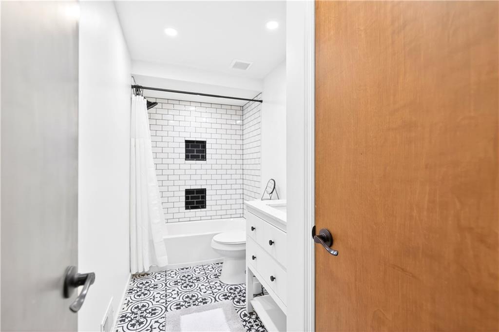 224 Salem Church Road Rostraver Township, PA 15012 - Photo 30 of 48 a bathroom with a toilet a sink and shower