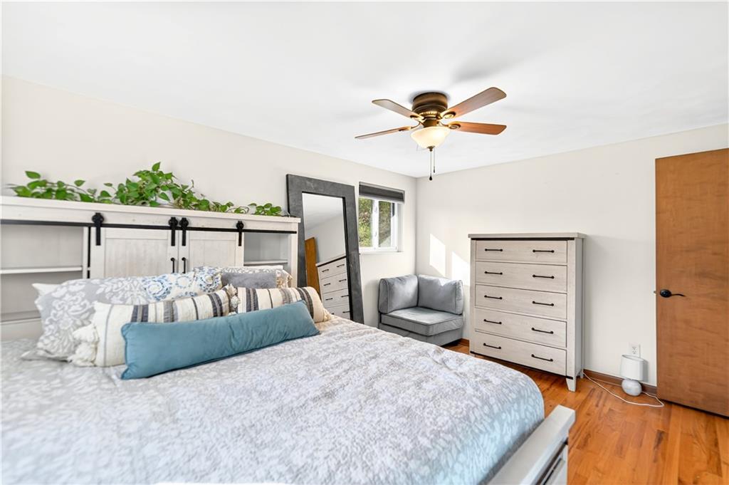 224 Salem Church Road Rostraver Township, PA 15012 - Photo 33 of 48 a bedroom with furniture and wooden floor