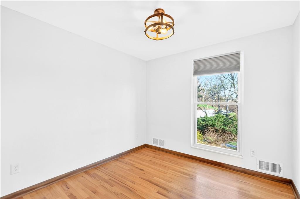 224 Salem Church Road Rostraver Township, PA 15012 - Photo 34 of 48 a view of a room with wooden floor and window