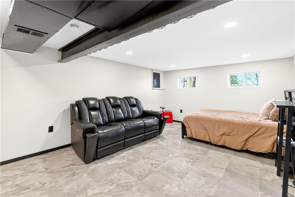 224 Salem Church Road Rostraver Township, PA 15012 - Photo 39 of 48 a spacious bedroom with a bed couch and a window
