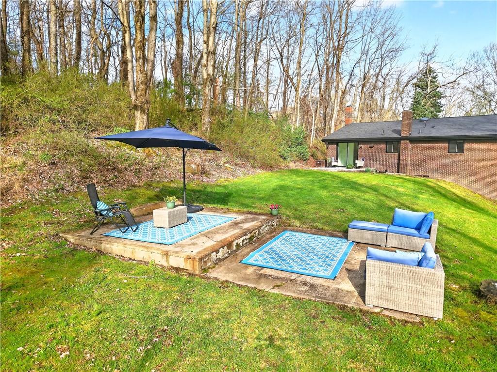 224 Salem Church Road Rostraver Township, PA 15012 - Photo 45 of 48 a view of a backyard with sitting area