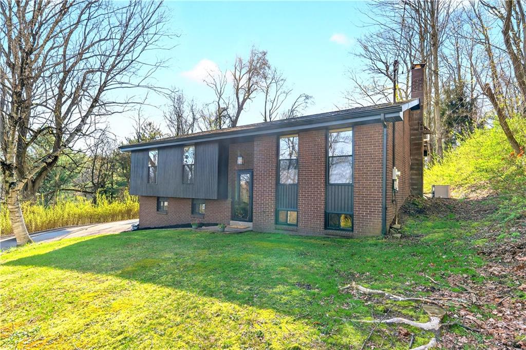 224 Salem Church Road Rostraver Township, PA 15012 - Photo 10 of 48 a view of a house with a yard and sitting area