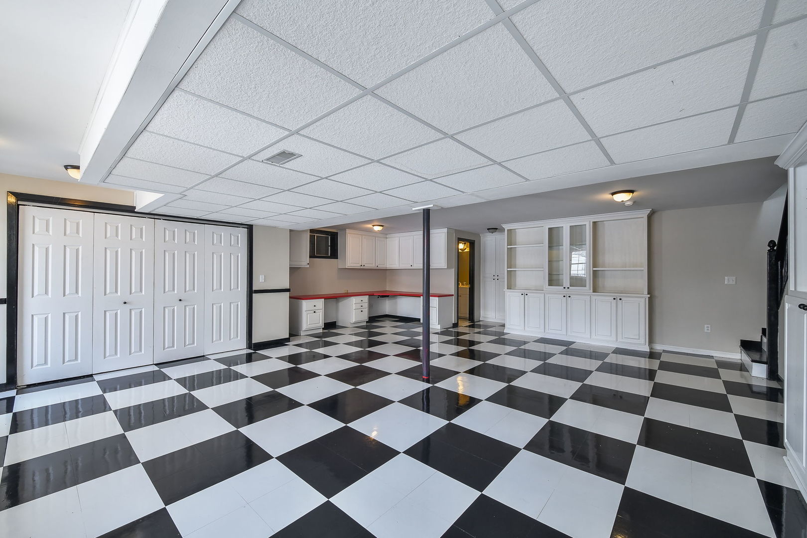 389 Colonial Circle Geneva, IL 60134 - Photo 19 of 25 a black and white checkered floor with a black white checkered floor