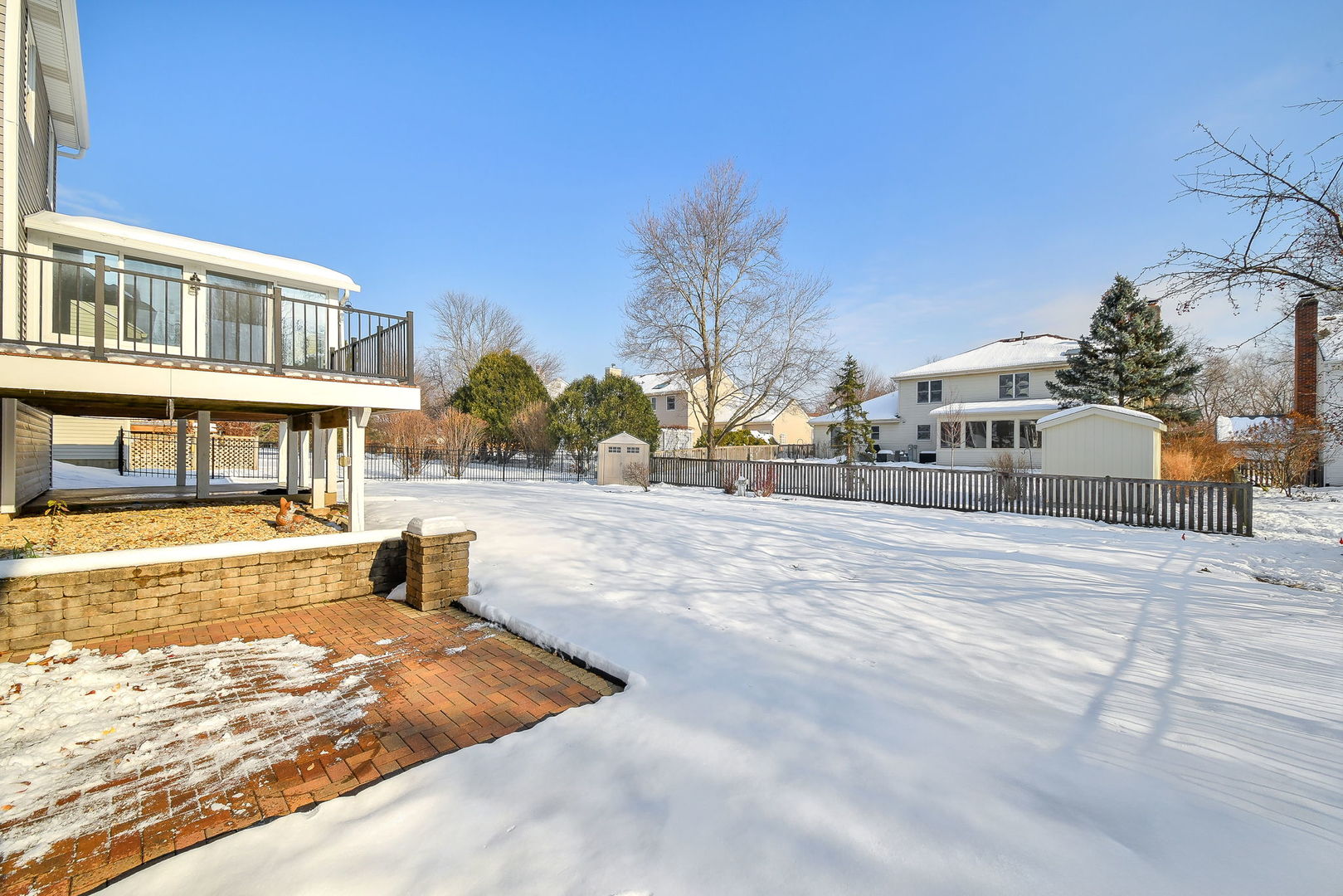 389 Colonial Circle Geneva, IL 60134 - Photo 25 of 25 a front view of a building with street
