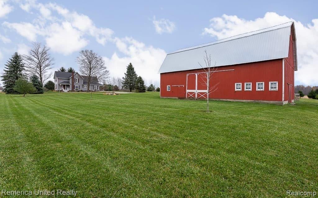 10181 Judd Road Fowlerville, MI 48836 - Photo 7 of 31 Exterior barn and home