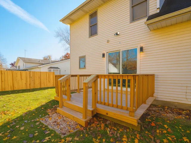 a view of balcony with wooden floor
