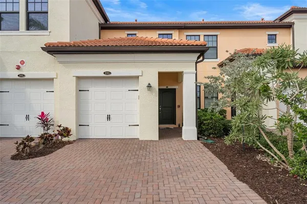 a view of a house with a garage