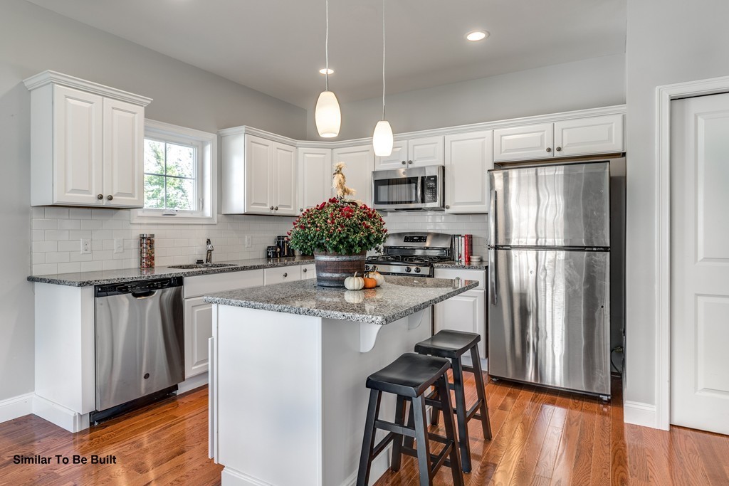 29 Eagle Nest Road, Unit 3 Long Valley, NJ 07853 - Photo 12 of 28 a kitchen with refrigerator and cabinets
