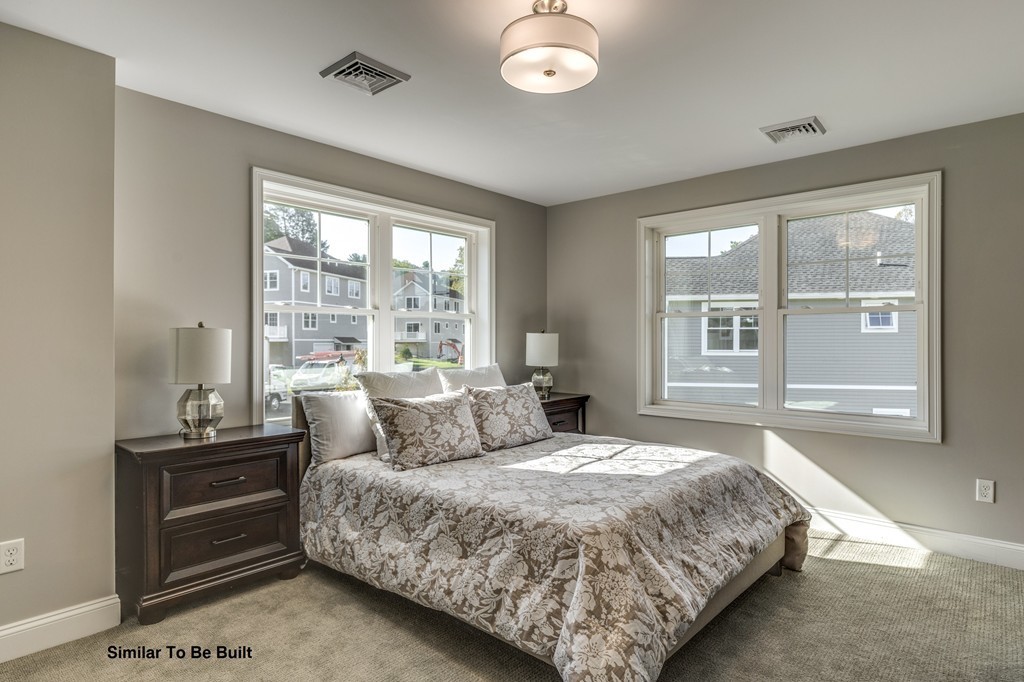 29 Eagle Nest Road, Unit 3 Long Valley, NJ 07853 - Photo 18 of 28 a bedroom with a bed and window