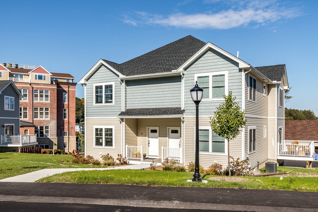 29 Eagle Nest Road, Unit 3 Long Valley, NJ 07853 - Photo 2 of 28 a front view of a house with a yard