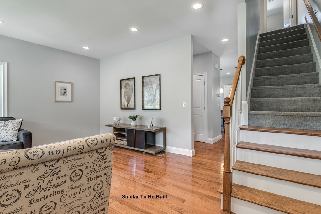 29 Eagle Nest Road, Unit 3 Long Valley, NJ 07853 - Photo 4 of 28 a living room with furniture and a wooden floor