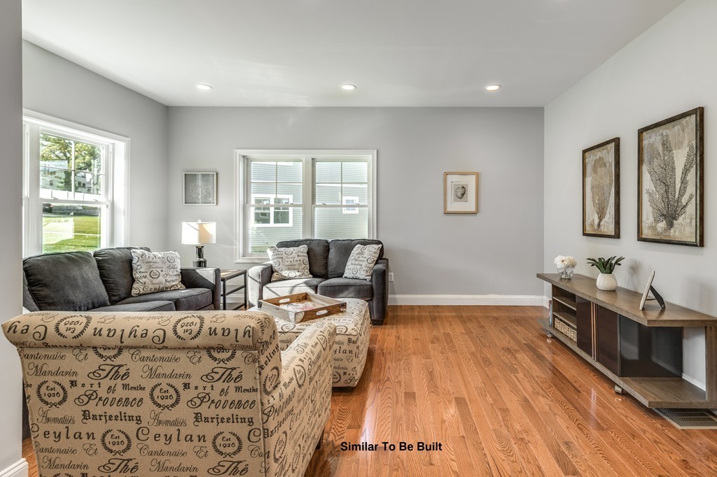 29 Eagle Nest Road, Unit 3 Long Valley, NJ 07853 - Photo 5 of 28 a living room with furniture and a hard wood floor
