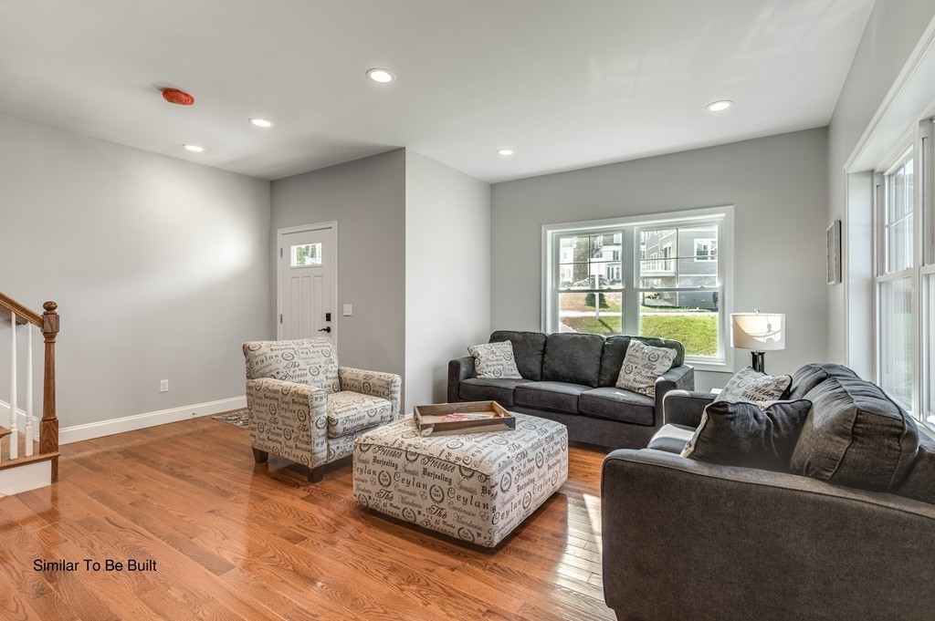 29 Eagle Nest Road, Unit 3 Long Valley, NJ 07853 - Photo 7 of 28 a living room with furniture and a window