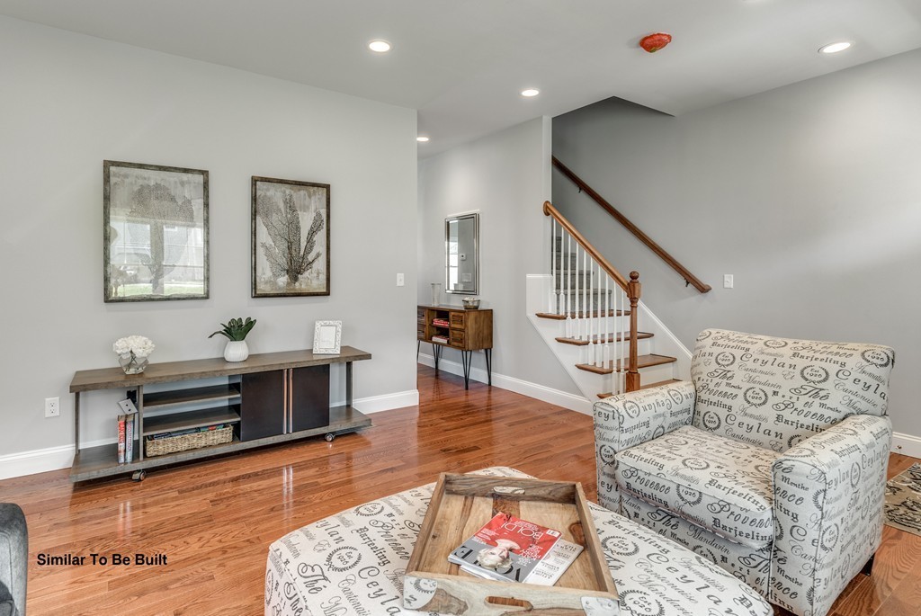 29 Eagle Nest Road, Unit 3 Long Valley, NJ 07853 - Photo 9 of 28 a living room with furniture and wooden floor