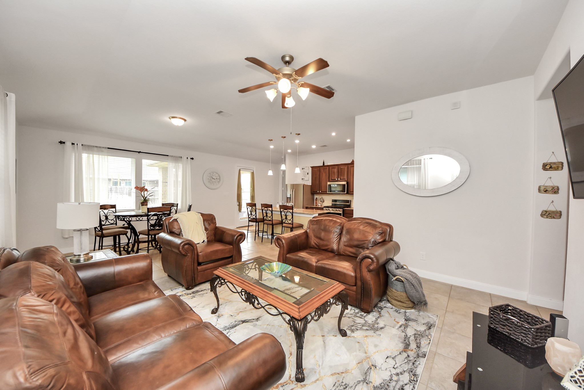 8806 Chapada Highlands Drive Cypress, TX 77433 - Photo 15 of 42 a living room with furniture and a wooden floor