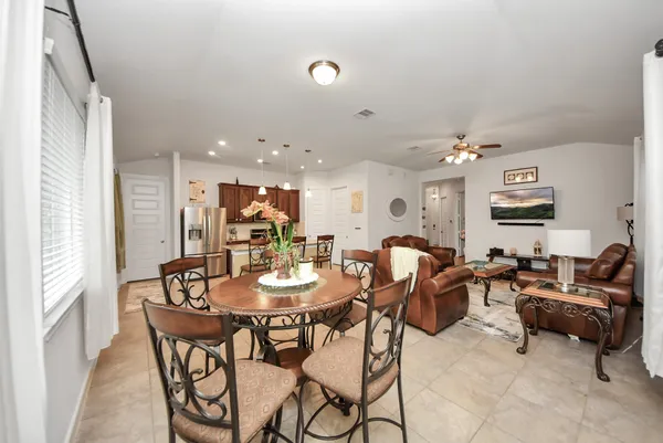 a view of a dining room with furniture