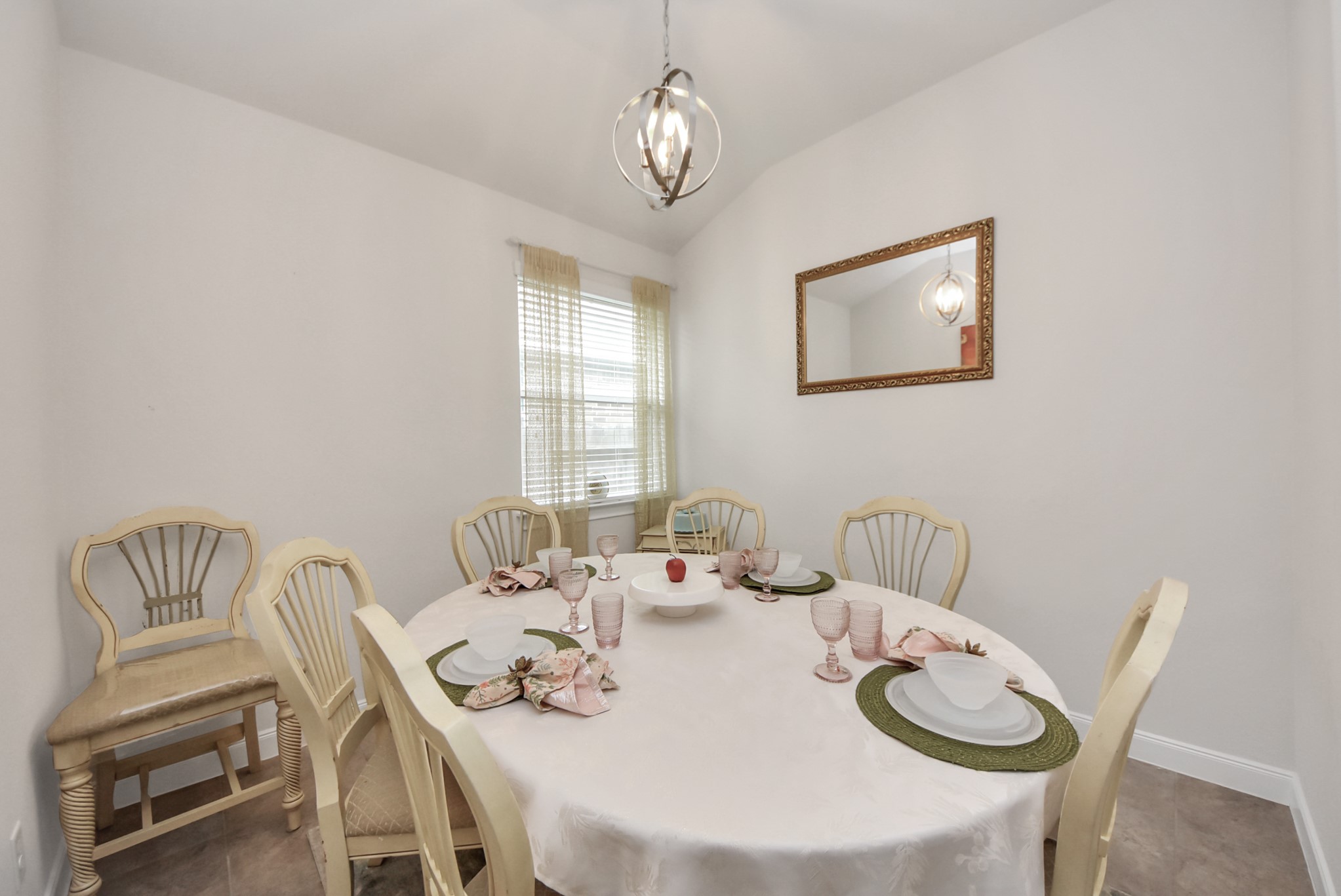 8806 Chapada Highlands Drive Cypress, TX 77433 - Photo 22 of 42 a view of a dining room with furniture window and outside view