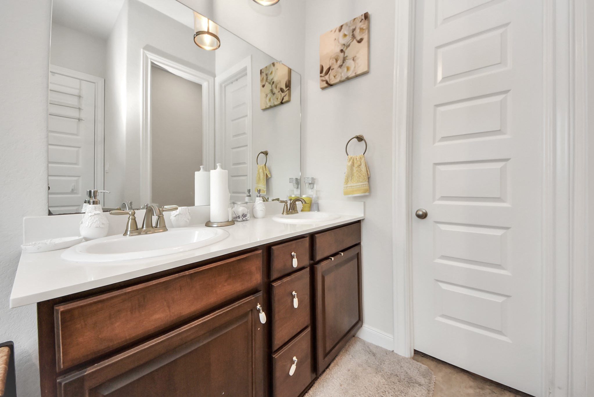 8806 Chapada Highlands Drive Cypress, TX 77433 - Photo 29 of 42 a bathroom with a sink and a mirror