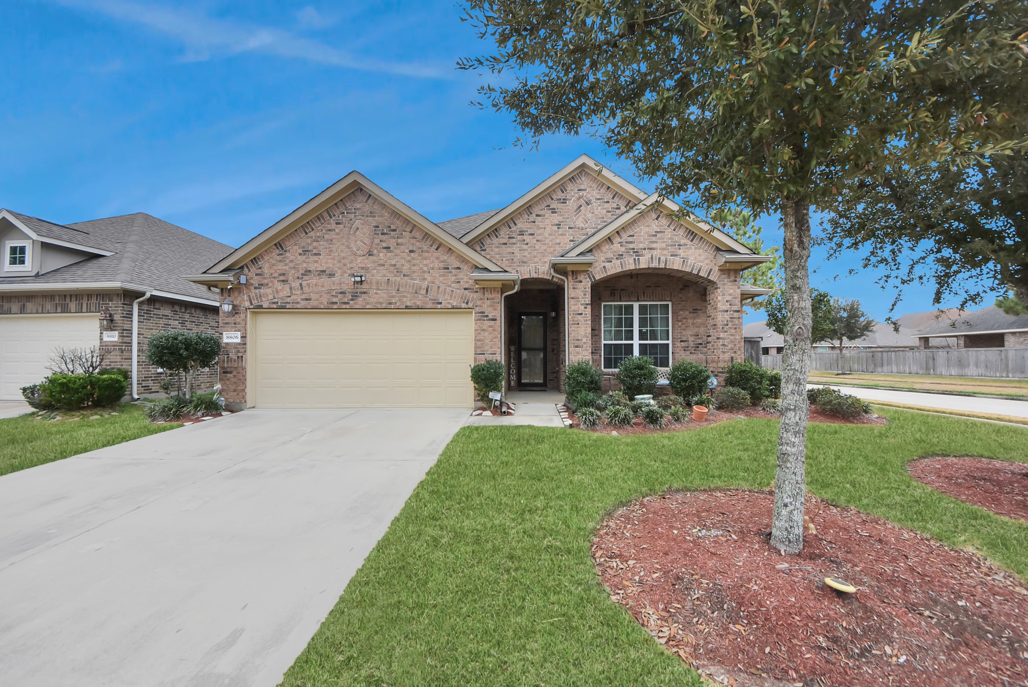 8806 Chapada Highlands Drive Cypress, TX 77433 - Photo 3 of 42 a front view of a house with a yard