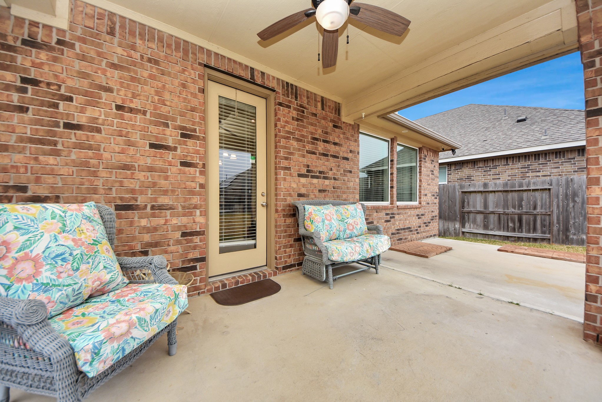 8806 Chapada Highlands Drive Cypress, TX 77433 - Photo 35 of 42 a living room with furniture and a fireplace