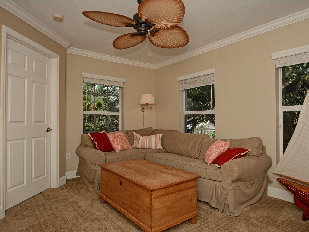 8705 Palm Tree Lane Vero Beach, FL 32963 - Photo 12 of 31 a living room with furniture and a window
