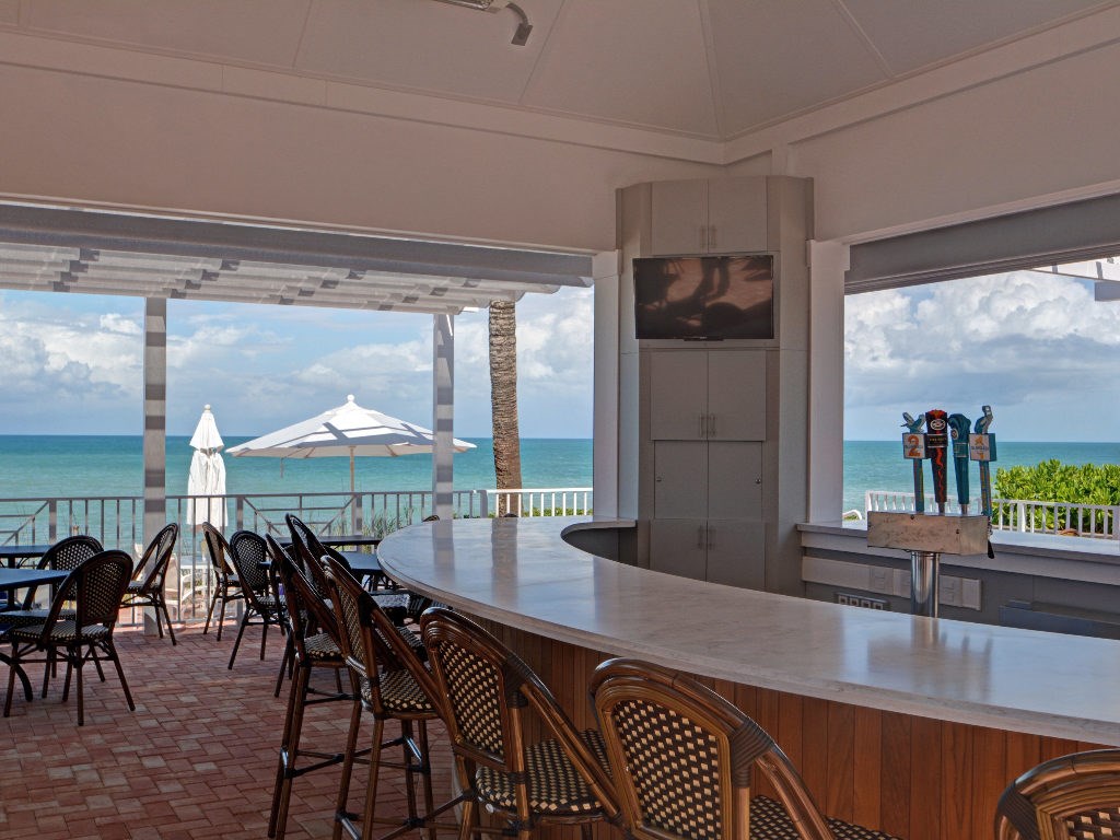 8705 Palm Tree Lane Vero Beach, FL 32963 - Photo 21 of 31 a dinning area with furniture and window