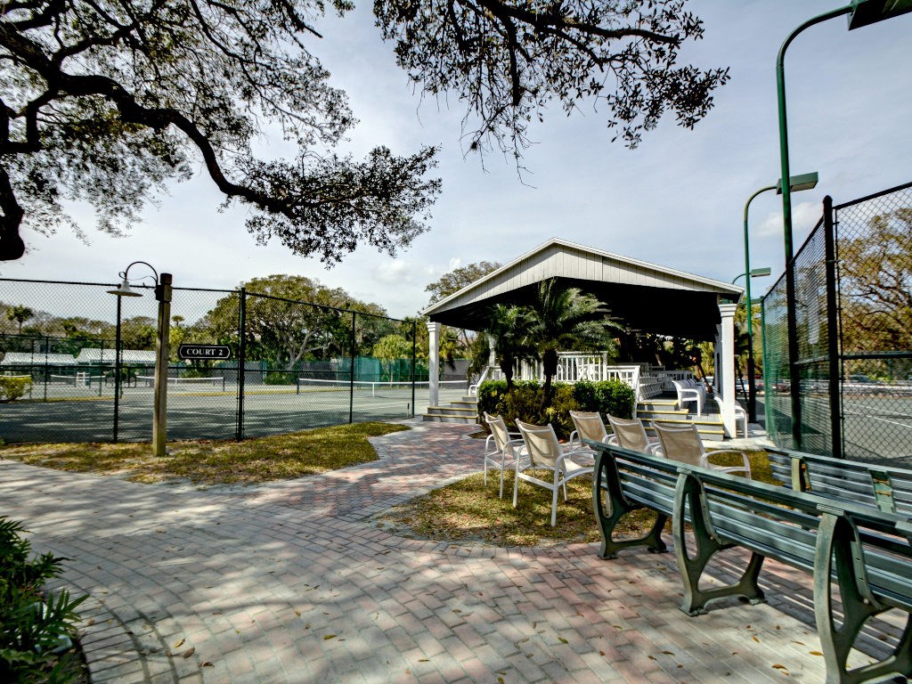 8705 Palm Tree Lane Vero Beach, FL 32963 - Photo 26 of 31 a view of a house with backyard porch and sitting area