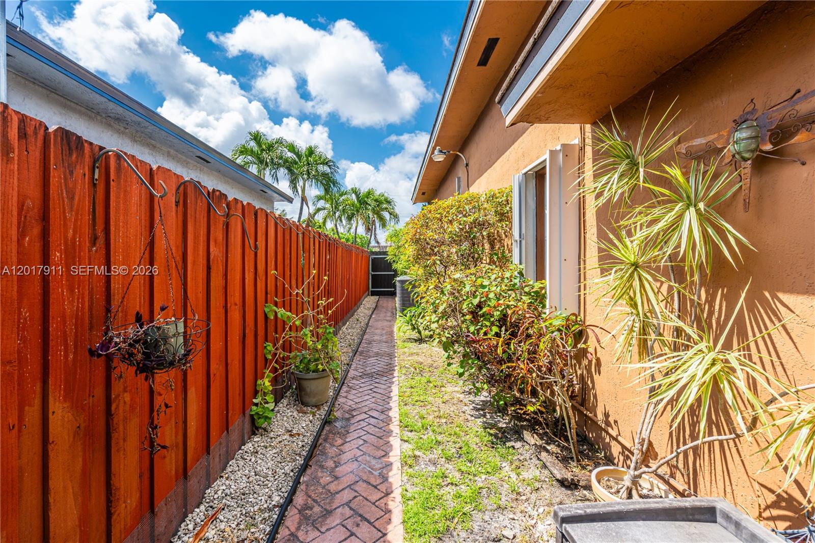 7811 Southwest 9th Terrace Miami, FL 33144 - Photo 25 of 26 Side yard, walk way
