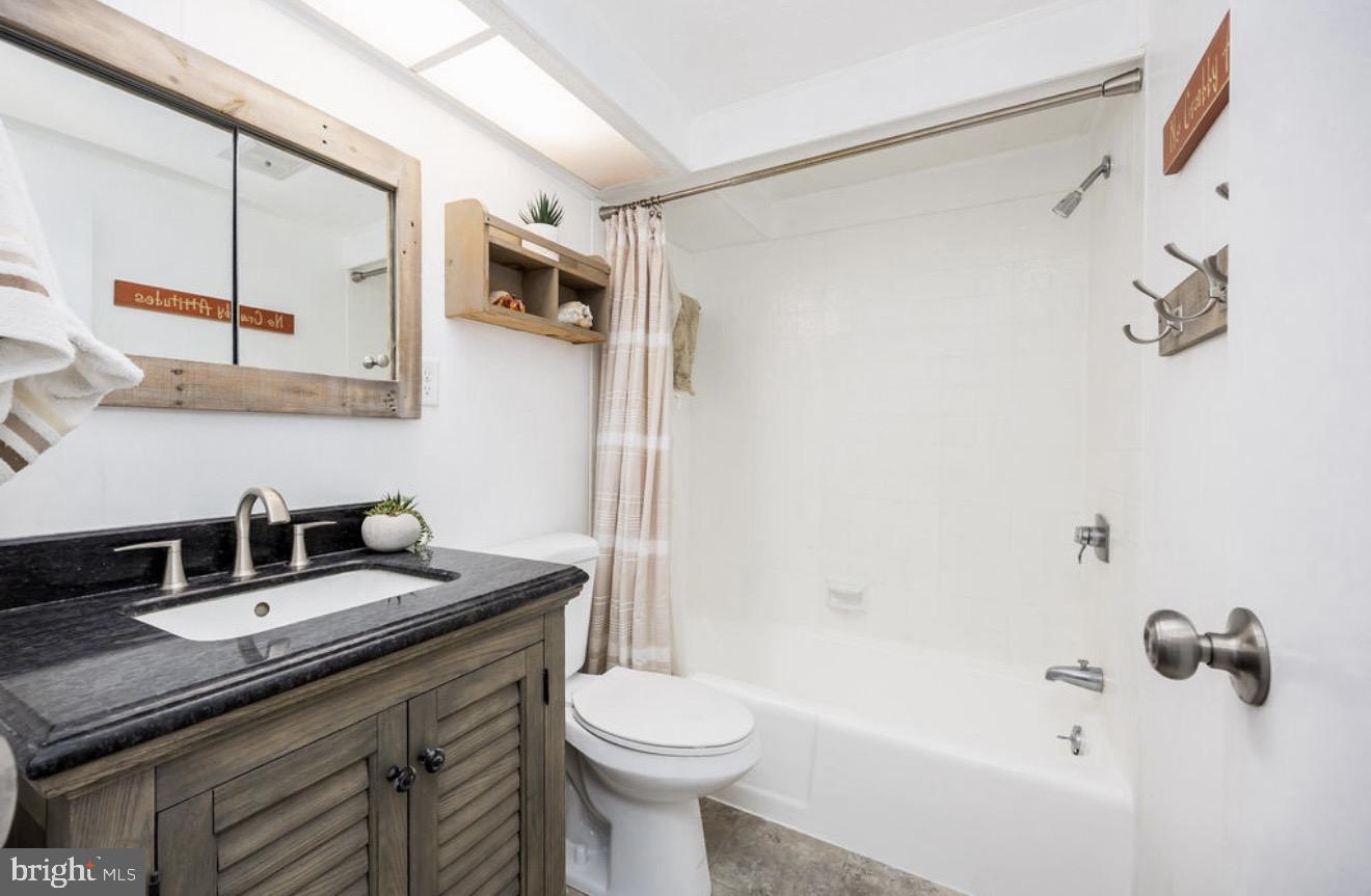 5 Falcon Bridge Road Ocean Pines, MD 21811 - Photo 22 of 59 a bathroom with a sink a toilet and shower