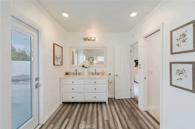 a room with a dresser and a mirror