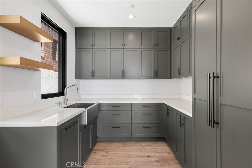 2 Twin Lakes Circle Corona del Mar, CA 92625 - Photo 21 of 31 a kitchen with a sink and cabinets