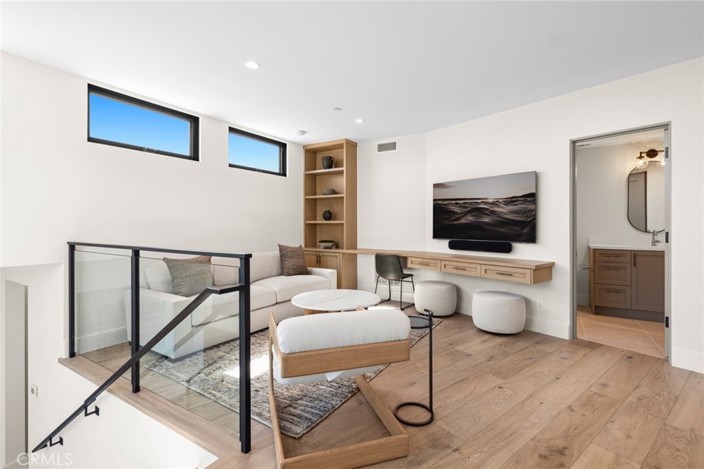 2 Twin Lakes Circle Corona del Mar, CA 92625 - Photo 23 of 31 a living room with furniture a flat screen tv and view of a bathroom