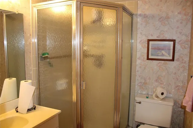 a view of balcony with furniture