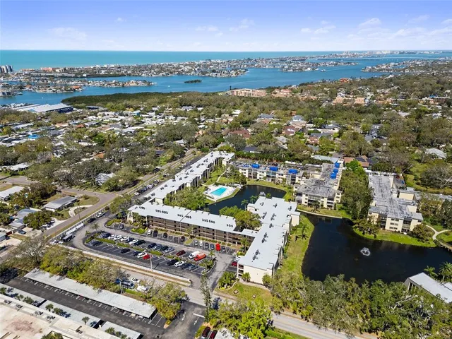 a view of a lake with a city