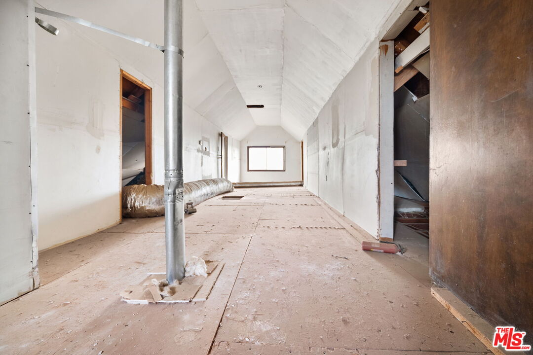 6906 Phelan Road Phelan, CA 92371 - Photo 20 of 42 a view of a hallway with closet and mirror