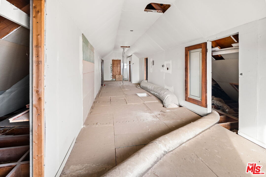 6906 Phelan Road Phelan, CA 92371 - Photo 22 of 42 a living room with furniture and a walk in closet
