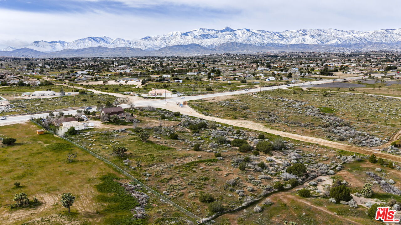 6906 Phelan Road Phelan, CA 92371 - Photo 34 of 42 a view of a city with mountains in the background
