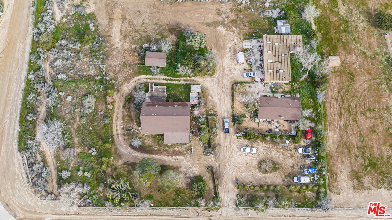 6906 Phelan Road Phelan, CA 92371 - Photo 39 of 42 aerial view of a house with a yard