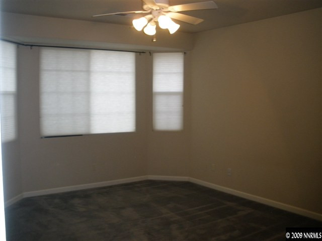 1803 Stetson Drive Reno, NV 89521 - Photo 5 of 9 an empty room with a window