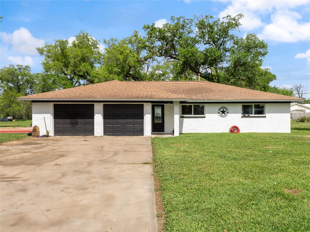 496 James Street Clute, TX 77531 - Photo 1 of 45 front view of a house with a yard