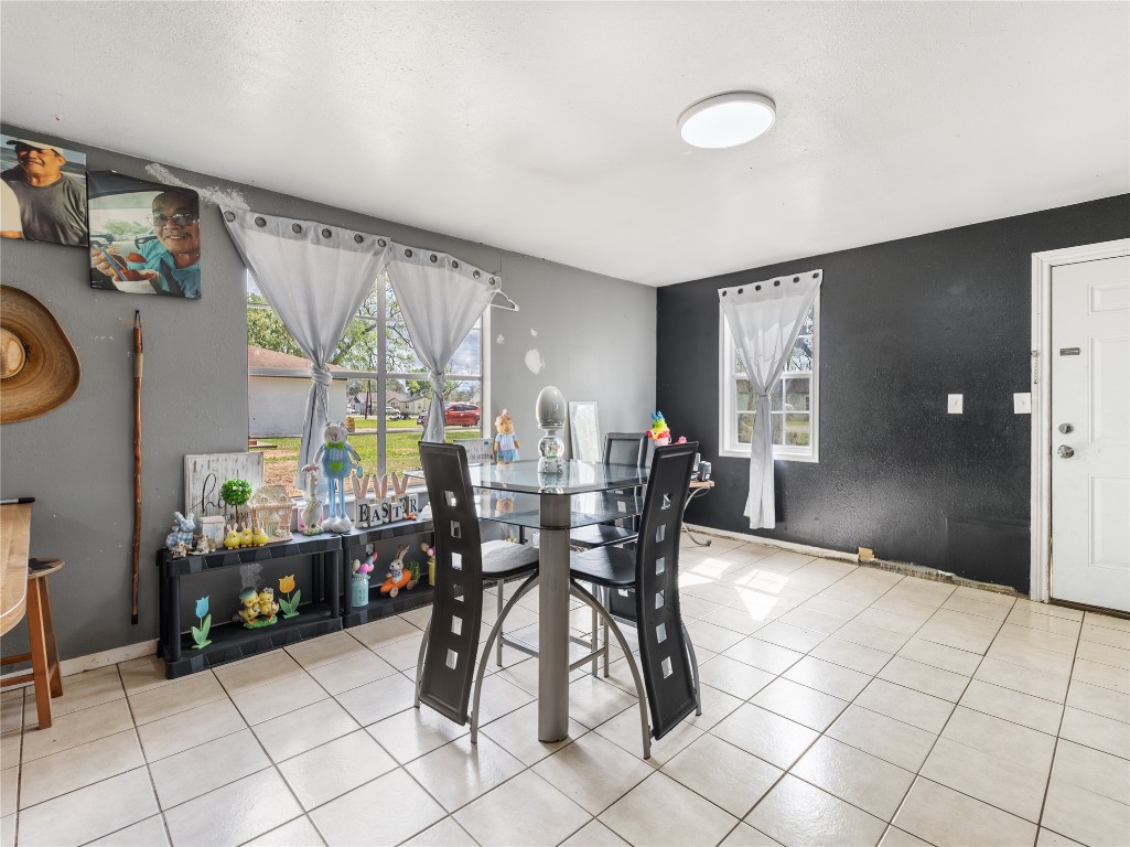 496 James Street Clute, TX 77531 - Photo 27 of 45 a dining room with furniture and window