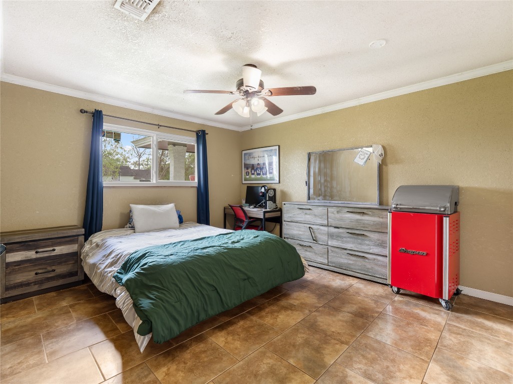 496 James Street Clute, TX 77531 - Photo 34 of 45 a bedroom with a bed and a closet