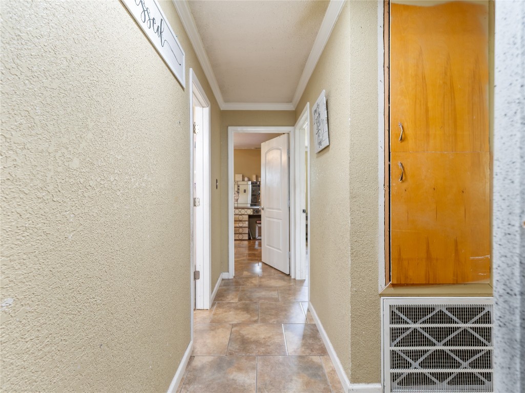 496 James Street Clute, TX 77531 - Photo 36 of 45 a view of a hallway with wooden floor and a door