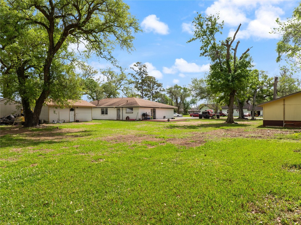 496 James Street Clute, TX 77531 - Photo 4 of 45 a view of a house with a big yard