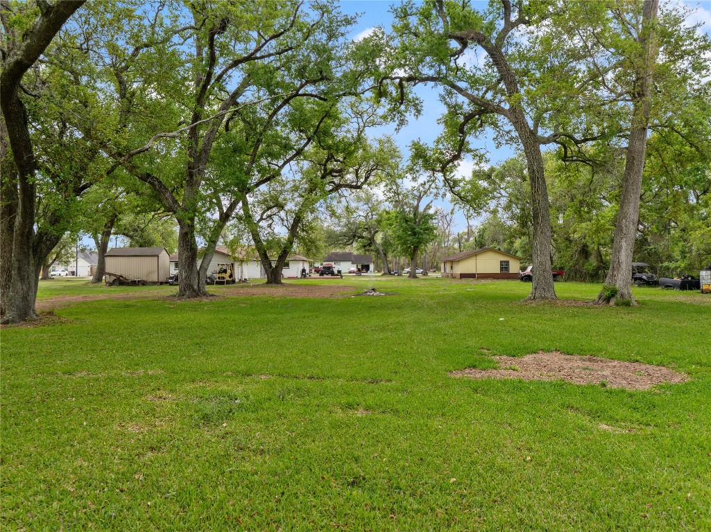 496 James Street Clute, TX 77531 - Photo 6 of 45 a view of grassy field with benches