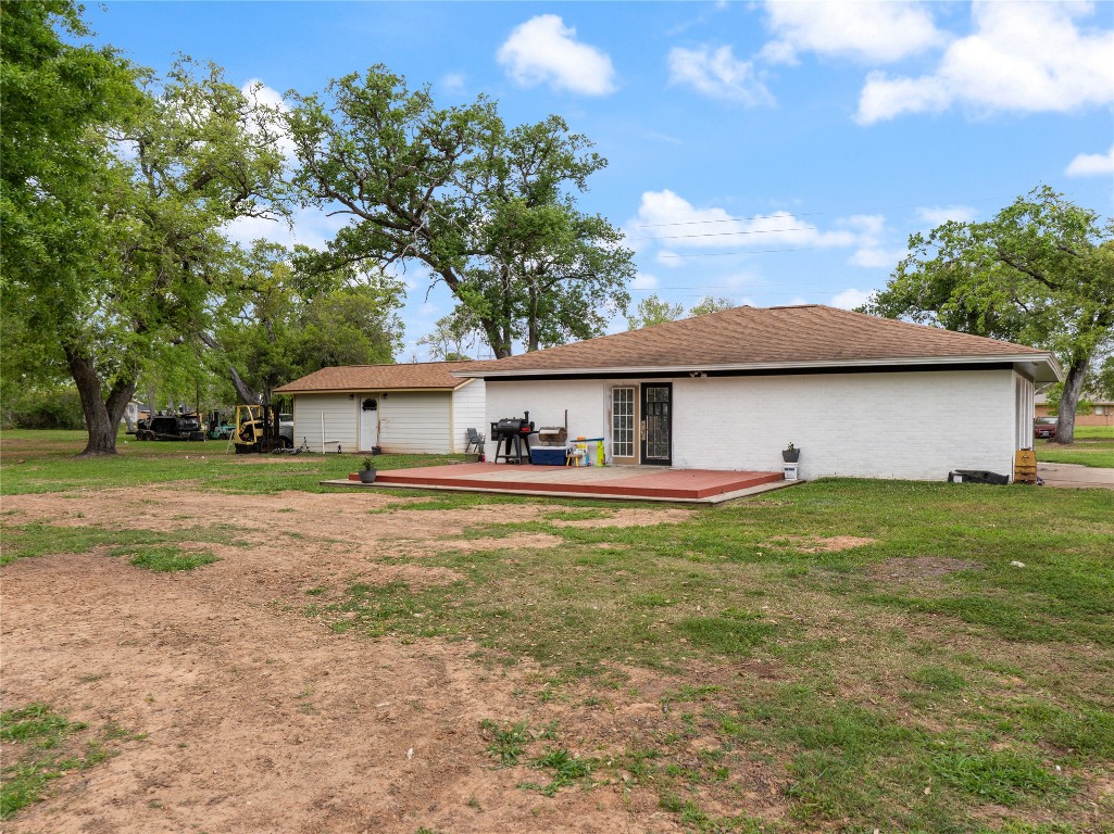 496 James Street Clute, TX 77531 - Photo 9 of 45 a front view of a house with a yard and garage