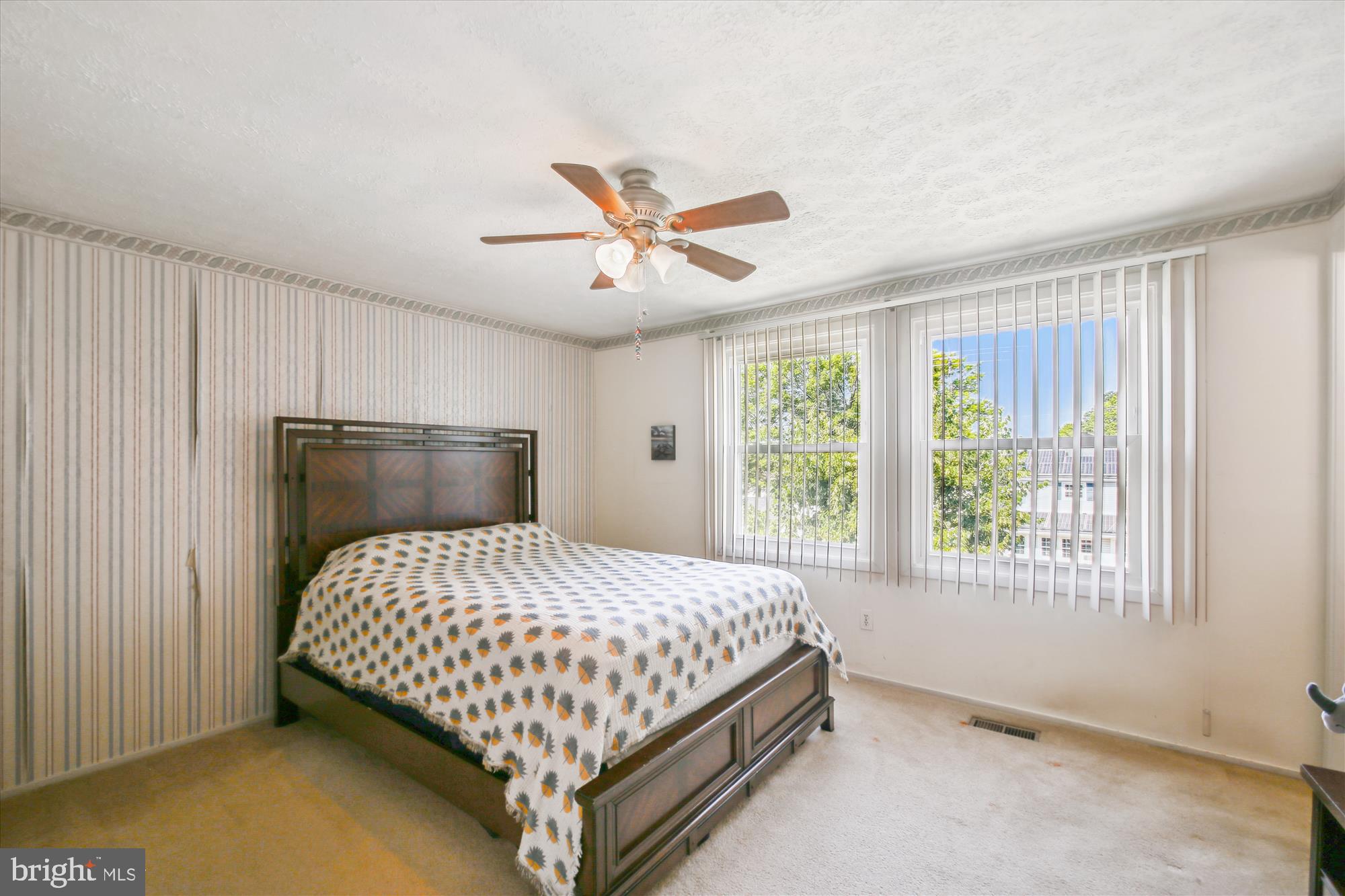 6424 St Phillips Road Linthicum Heights, MD 21090 - Photo 11 of 29 a bedroom with a bed and window