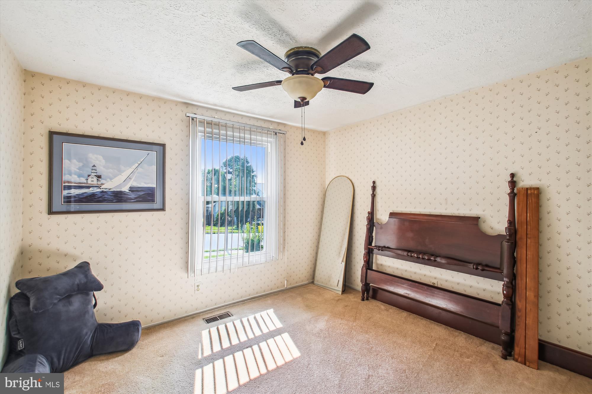 6424 St Phillips Road Linthicum Heights, MD 21090 - Photo 14 of 29 a living room with furniture and a window