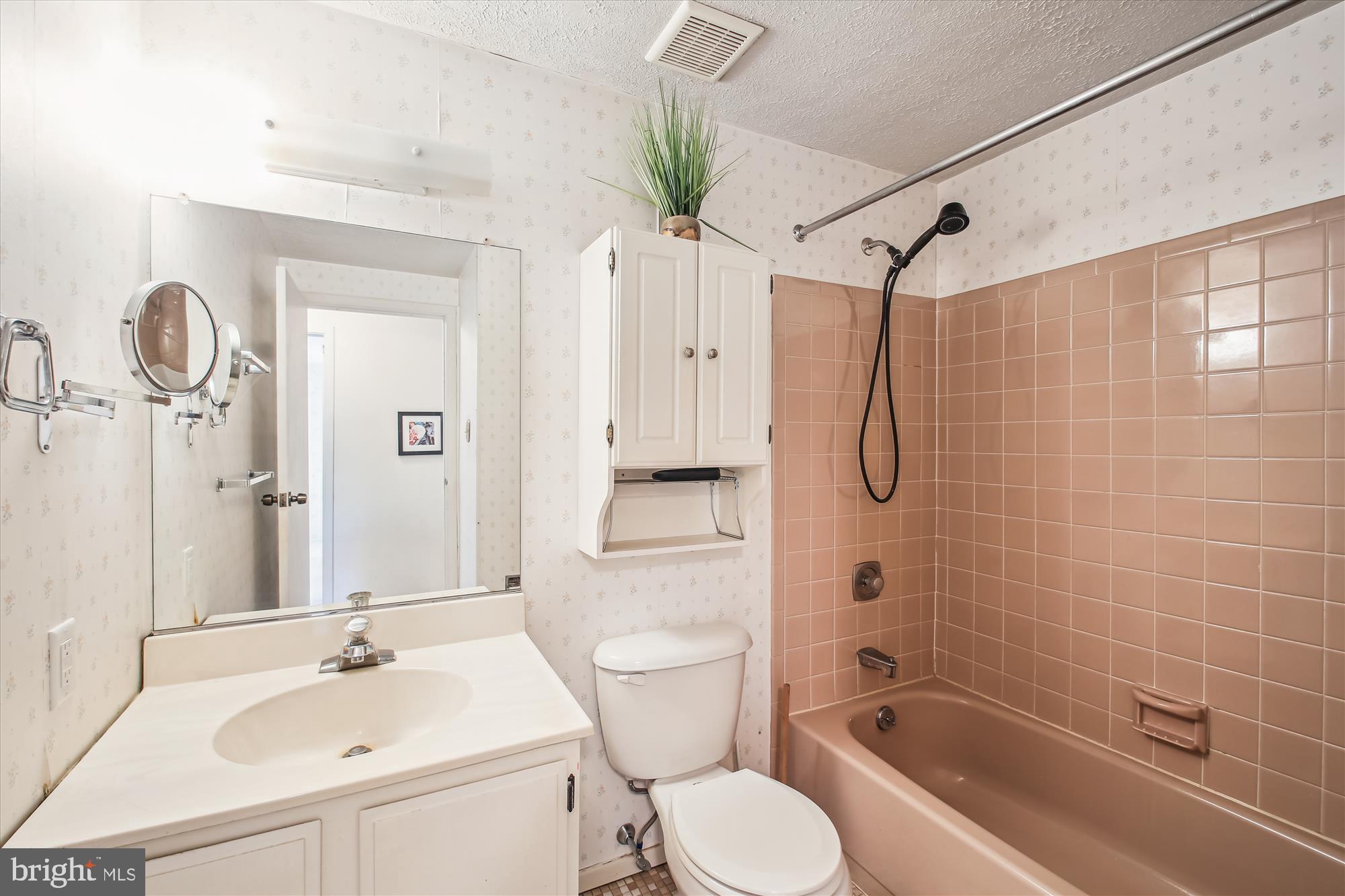 6424 St Phillips Road Linthicum Heights, MD 21090 - Photo 16 of 29 a bathroom with a sink a toilet and shower