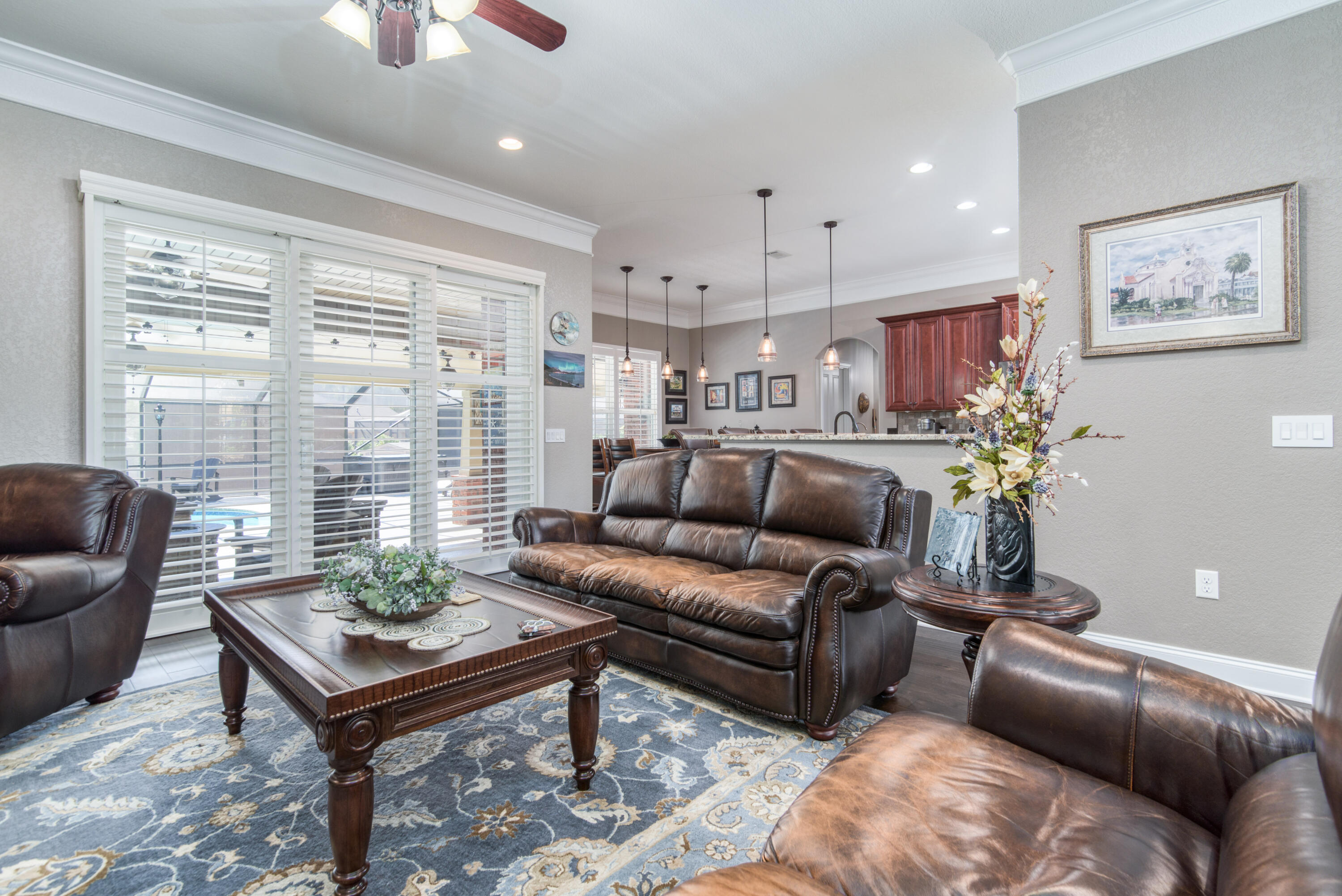 4563 Pfitzer Circle Crestview, FL 32536 - Photo 12 of 79 a living room with furniture and a large window